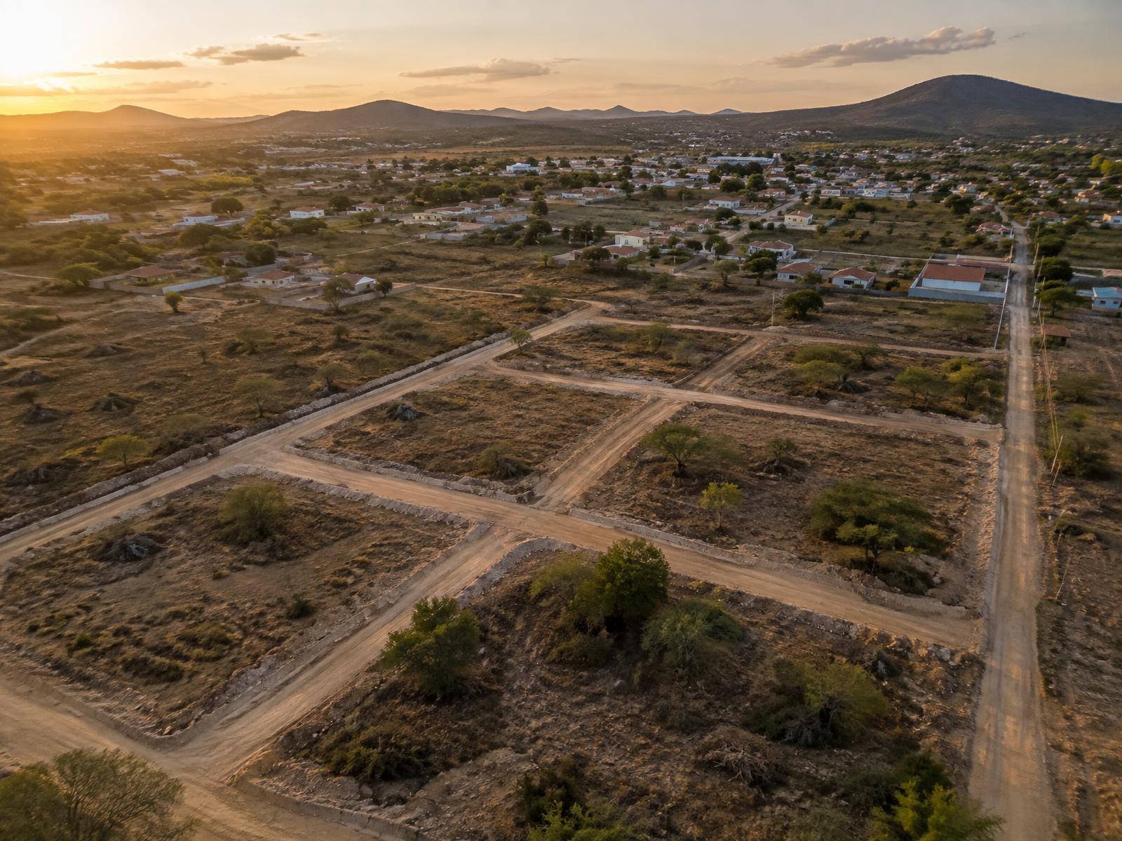 Vista aérea de loteamento com linhas topográficas